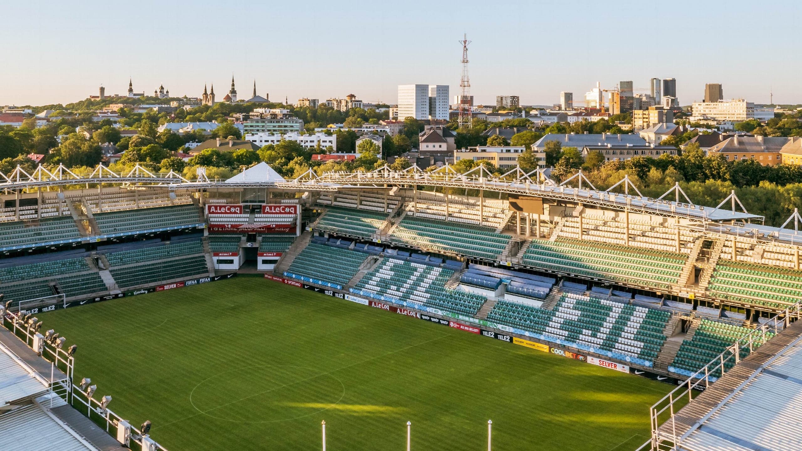 A. Le Coq Arena from above, with the Old Town spires behind it